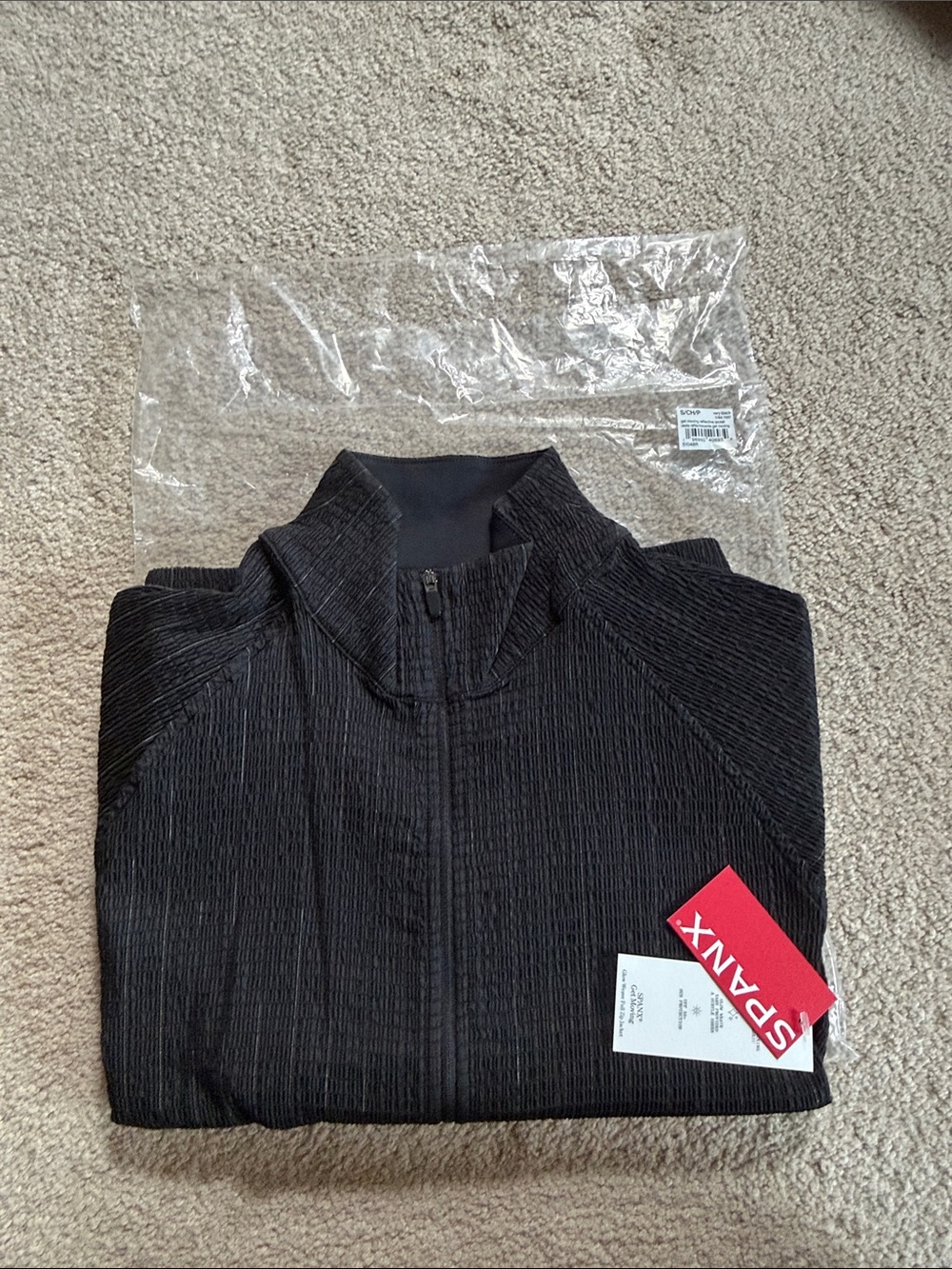 SPANX Women’s Get Miving Jacket. Glow weave full zip jacket. Black.